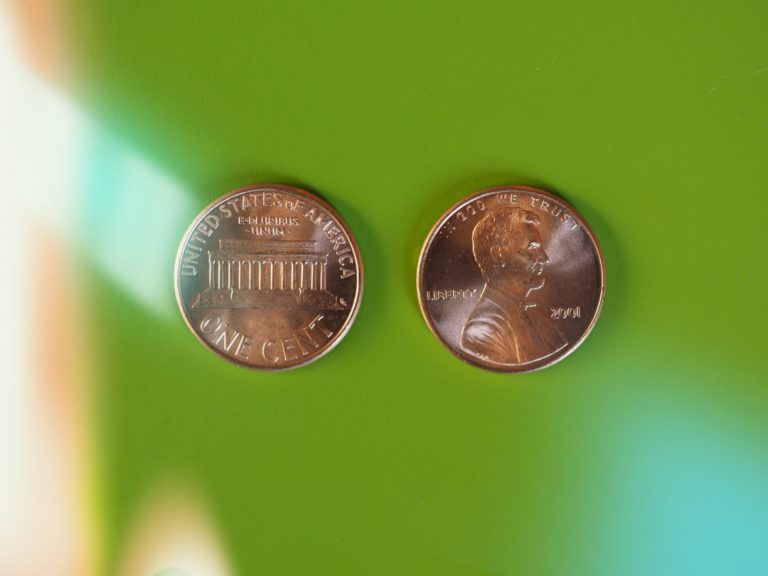 TheREDWords.website/BLOG page. A photo of two copper pennies showing heads and tails.