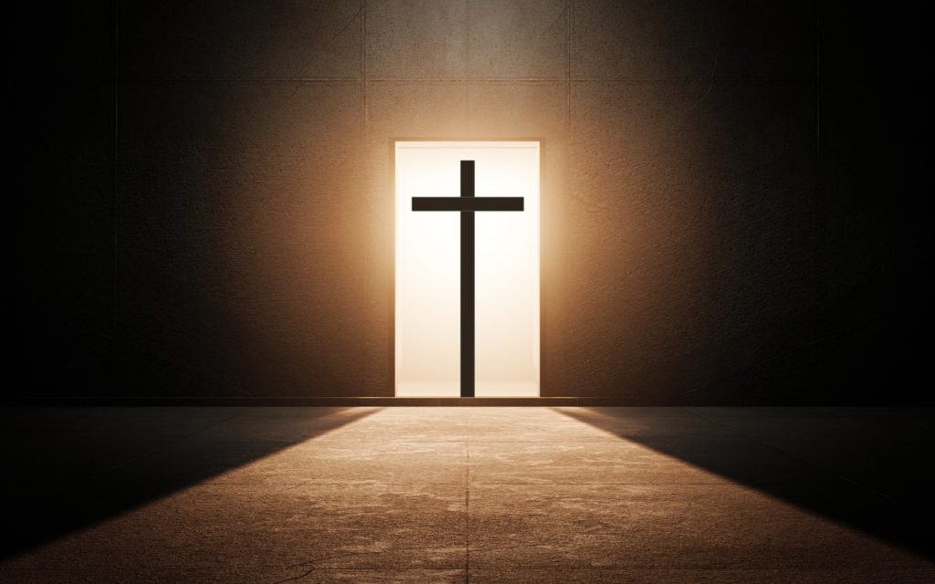 TheREDWords.website/BLOG page. A photorealistic image of a cross in a brightly lit doorway.