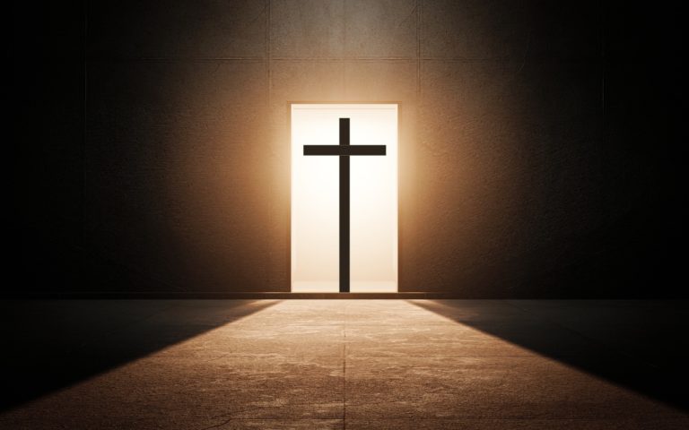 TheREDWords.website/BLOG page. A photorealistic image of a cross in a brightly lit doorway.